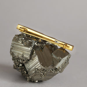 Back of a gold brooch, 18ct gold brooch with baguette cut diamond and textured surface