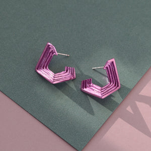 18ct white gold earrings made to order, with geometric layered texture and lilac nano-ceramic coating