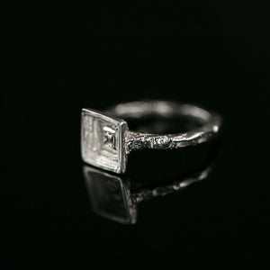 Cavetto 18ct white gold ring, engagement ring with princess cut diamond and handmade texture