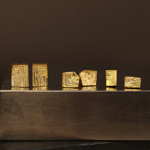 Three pairs of 18ct Xyz gold stud earrings in geometric shapes, textured fine jewellery, cartesian jewellery collection