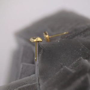 Sculptural Tessara 18k gold stud earrings with antique, rusticated texture