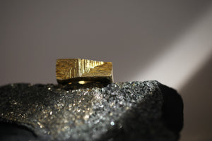 Artistic 18ct gold signet ring with hand-carved texture resembling mineral striations, jewellery for men