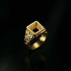 Cavetto statement signet ring in sculpted 18kt yellow gold and concave square front with truncated layers.