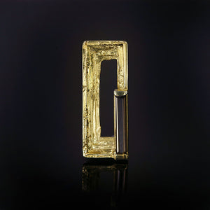 Cavetto 18kt gold architectural lapel pin with smoky quartz faceted baguette and hand-textured layers, front view.