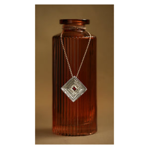 Corona Laminae 18kt white gold and dark pink princess square rhodolite garnet statement pendant necklace, presentation.