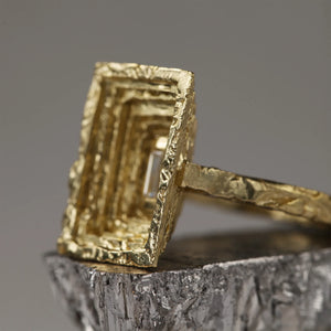 Sculptural Frustum ring in stratified 18kt gold and white baguette diamond, crown mounting and setting details. Part of the Classical Collection.