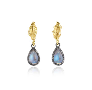 Lava Iridesce sculptural statement 18kt gold, oxidised silver and rainbow moonstone drop stud earrings with textured volcanic design, front view.
