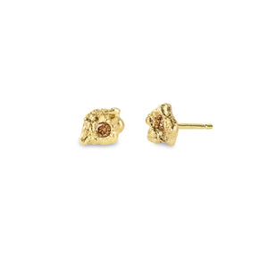 Lava Umber everyday 18kt gold stud earrings with round brown diamonds and sculptural, raw texture, front view.