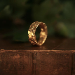 Liquid Aurum Alto wide 18kt yellow gold statement ring with forged texture and raw design, profile details.