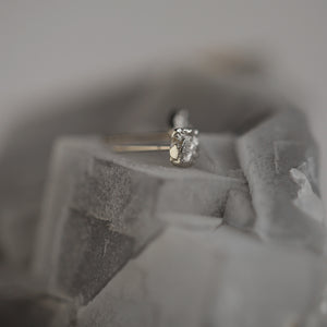Tessara unisex statement stud earrings in 18kt white gold and rusticated fire-sculpted texture, side view.