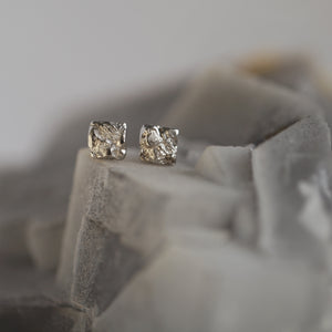 Tessara statement earrings in sculpted 18kt white gold shaped in antique, rusticated square tile.