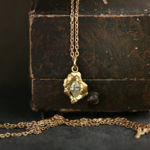 18ct gold pendant necklace with yellow diamond marquise and molten texture