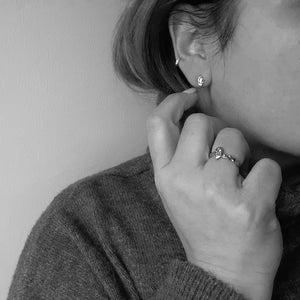Lava Naples ring and earring set in sculpted 18kt gold with marquise-cut yellow diamonds, worn on model.